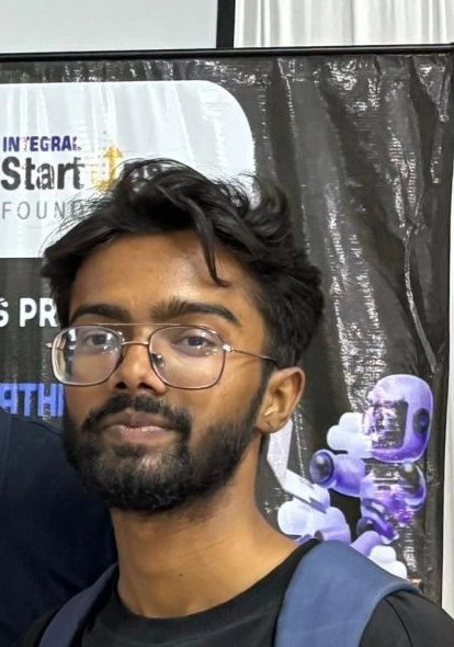 Pranjul Rathour in front of an Integral Startup Foundation hackathon backdrop