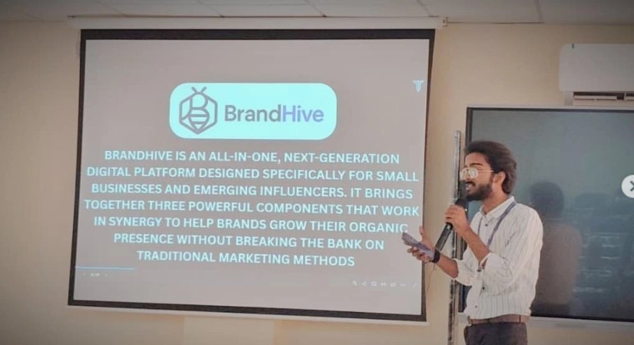 Pranjul Rathour presenting BrandHive on a projector screen