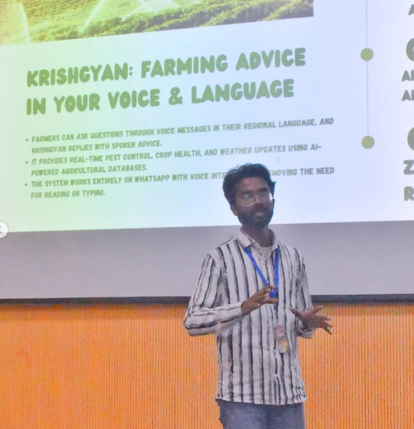 Pranjul Rathour presenting KrishGyan — farming advice in your voice and language — in front of a projector screen